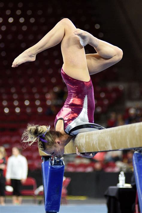 University of Denver gymnast Julia Ross holds a pose during her beam mount. Photo taken on March ...