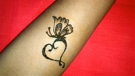 Heart with Butterfly Tattoo Designs | Heart Butterfly Mehndi Tattoos ...