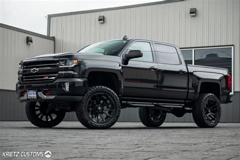Lifted 2018 Chevrolet Silverado 1500 with 22×10 Fuel Blitz Weels with 7 inch Rough Country ...