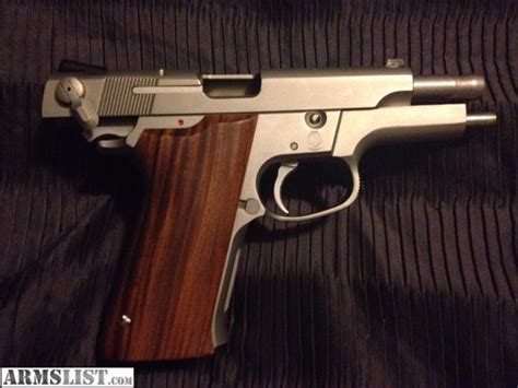 ARMSLIST - For Sale: S&W 5906 9mm w/ hogue wood grips