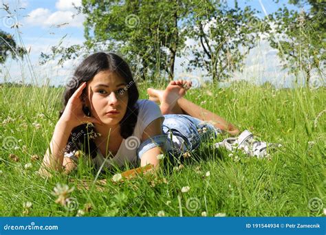 Teenage Schoolgirl Lying in Grass Stock Photo - Image of grass, schoolgirl: 191544934