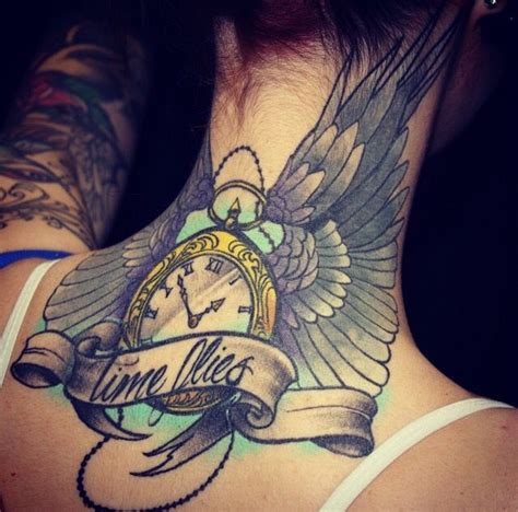 Time flies tattoo on back of he neck. Clock with wings , banner and script. Edmonton tattoo ...