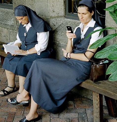 modern Daughter of St Paul sister checking her mobile phone | Nuns habits, Bride of christ, Nun ...