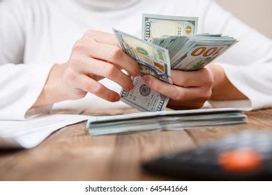 Hand Holding Banknotes Counting Money Stock Photo 2130388667 | Shutterstock