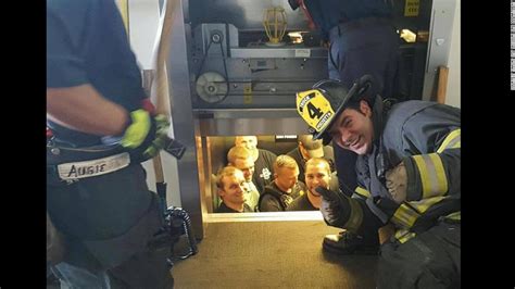 12 police officers stuck in an elevator? That's Internet gold - CNN