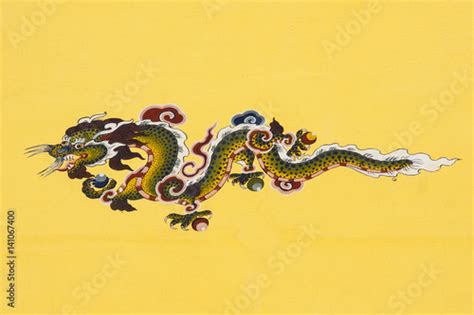 Traditional ancient style bhutanese wall painting, dragon, on the plastered house wall, painted ...