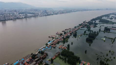 China: At least 14 dead as Yangtze river rises 50ft above flood level | World News | Sky News