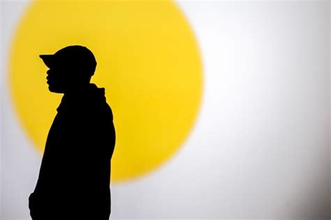 Premium Photo | Close-up of silhouette boy against white background