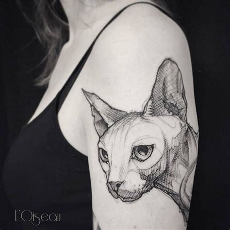 Sketch work sphynx tattoo on the left upper arm. | Sphynx cat tattoo, Cat tattoo, Body art tattoos