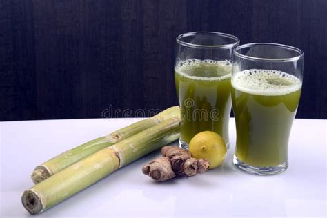 Sugar Cane Juice with Lemon and Ginger and Sugar Cane Stock Image ...