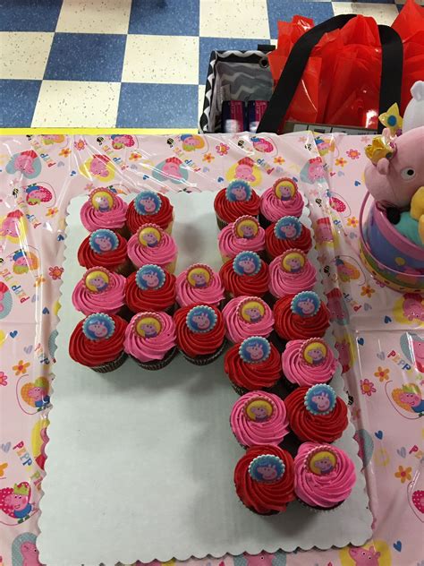 Peppa Pig number 4 cupcake cake with Peppa Pig rings on top. | Birthday cupcakes boy, Peppa pig ...