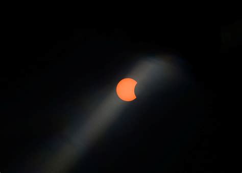 In pictures: Rare hybrid solar eclipse - April 20, 2023 | Reuters