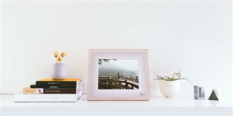 Aura is the modern digital picture frame that makes your photos into works of art