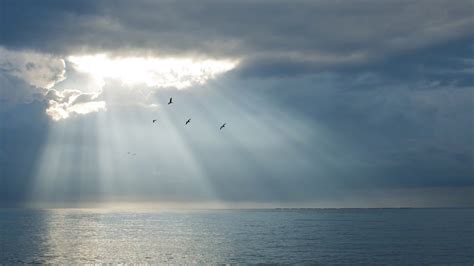 Sun and Clouds over the Ocean