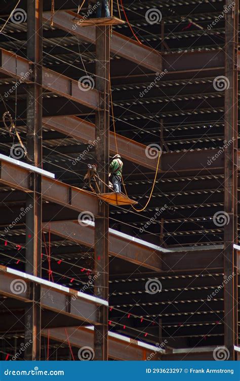 Ironworker with Safety Line Working on the Outside of Steel Framing ...