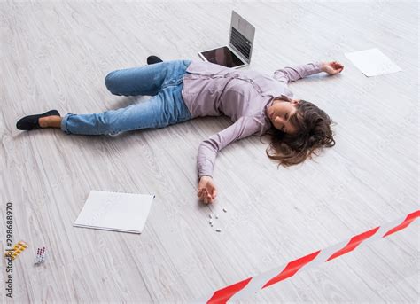 Dead woman on the floor after commiting suicide Stock Photo | Adobe Stock