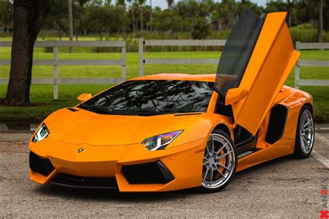 Nice Custom Exterior Goodies on Orange Lamborghini Aventador — CARiD ...