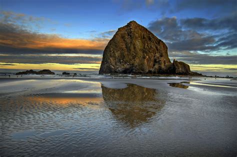 Haystack Rock Reflection in Cannon Beach Oregon Coast at Sunrise. | Cannon beach oregon, Cannon ...