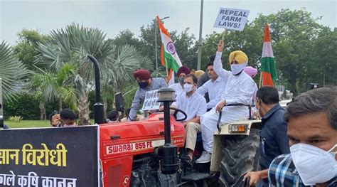 Rahul Gandhi rides tractor to Parliament to protest against new farm ...