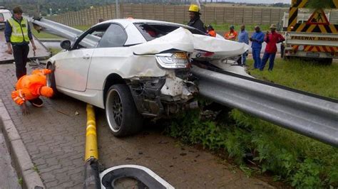 Amazing crash: BMW 335i hits guard rail, no one gets hurt!