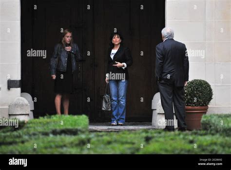 Dominique Strauss-Kahn and his wife Anne Sinclair flanked by Anne Hommel arrive at their ...