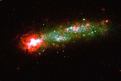 Tadpole galaxy spawns stars after eating invisible gas cloud | New Scientist