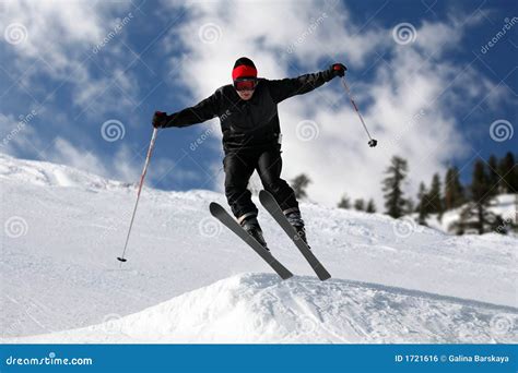 Skier jumping stock photo. Image of travel, jump, snow - 1721616