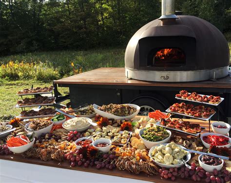 Wood Fired Pizza Catering — open hearth pizza