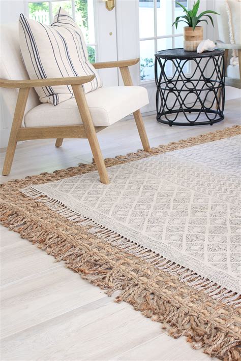 Tips to Layering Neutral Rugs + Beach cottage living room update - The ...