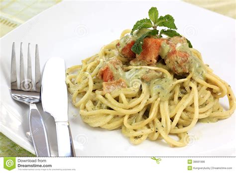 Spaghetti and Salmon in Pesto Sauce Stock Photo - Image of fish, cooking: 38681998