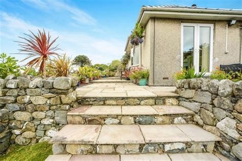 Inside the Harlech house with views of the castle to one side and ...