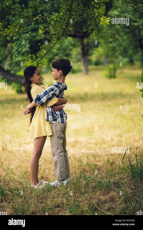 Little kids hugging Stock Photo - Alamy