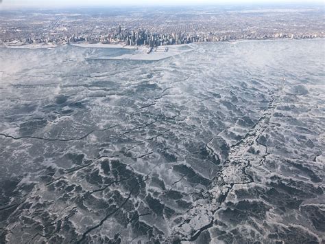 In pictures: Lake Michigan completely freezes amid extremely dangerous temperatures - Strange Sounds