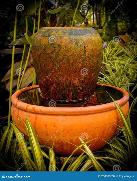 Garden Water Feature Urn Stock Photos - Free & Royalty-Free Stock Photos from Dreamstime