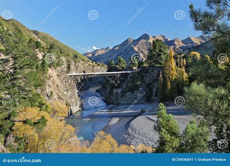 Bridge Crossing River - Fall Colors Stock Image - Image of arch, autumn ...