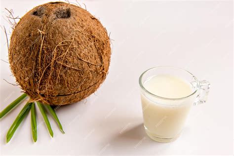 Premium Photo | Coconut and coconut milk on white background