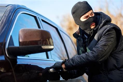 Car thief stock photo. Image of action, hooligan, land - 50715638