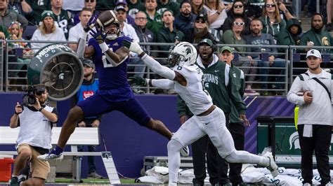 Washington Huskies hand Michigan State Spartans their first loss, 39-28