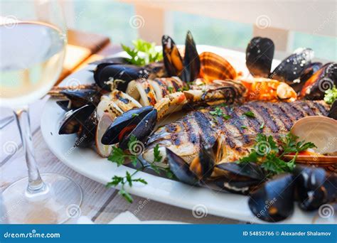 Grilled seafood platter stock photo. Image of variety - 54852766