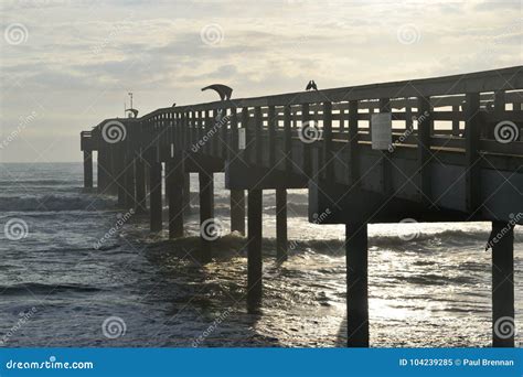 Fishing Pier on St. Augustine Beach Stock Image - Image of diminishing ...