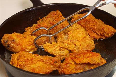 Fried Chicken Cooking In A Frying Pan Stock Image - Image: 5262199