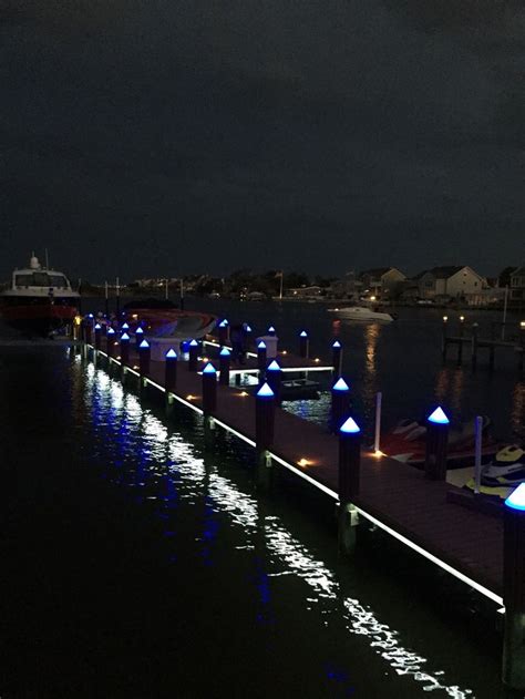 Illuminating LED Dock Lights | Dock lighting, Facade lighting, Lake houses exterior