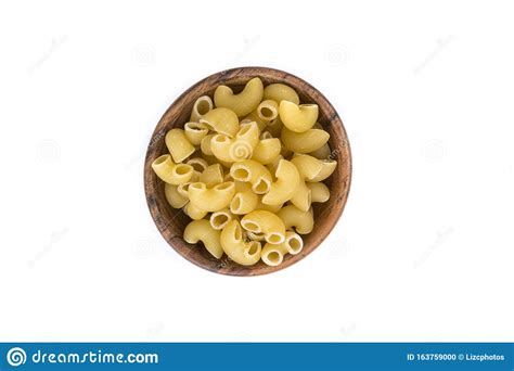 PIle of Yellow Dried Elbow Macaroni Pasta Shapes Stock Photo - Image of depth, cooking: 163759000