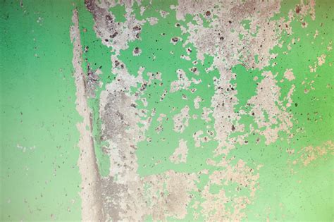 Free Image of Chipped Green Paint on Cement Wall | Freebie.Photography