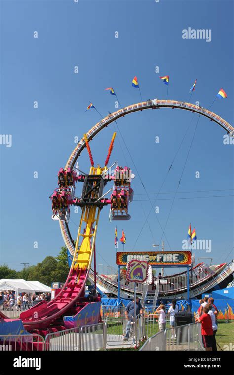 G Force and Ring Of Fire Carnival Rides Canfield Fair Canfield Ohio Stock Photo - Alamy