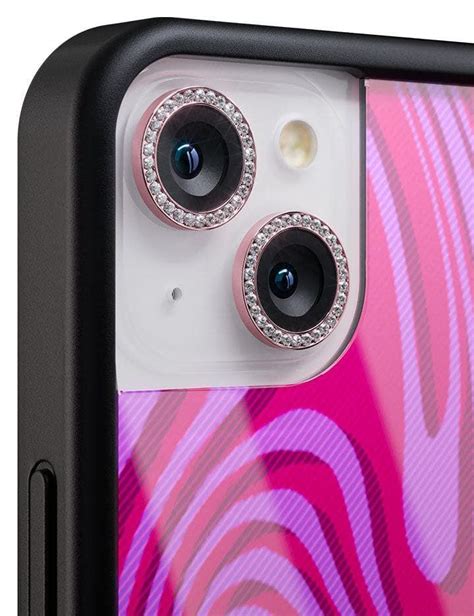 an iphone case with two cameras attached to the back of it, in front of ...