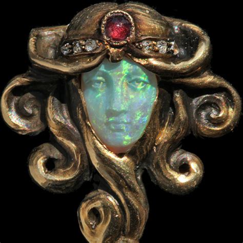 A short history: the delicate art of carved opal jewels | the jewelry loupe