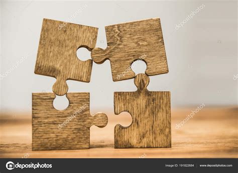 Four Wooden Puzzle Pieces Wooden Background Concept Connection People ...