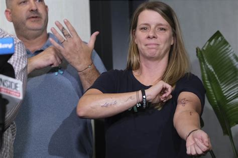 Gabby Petito's family shows matching tattoos during presser