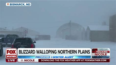 Near white-out conditions reported in North Dakota during season's first major winter storm ...